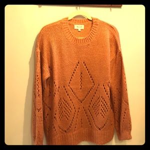 Light orange sweater